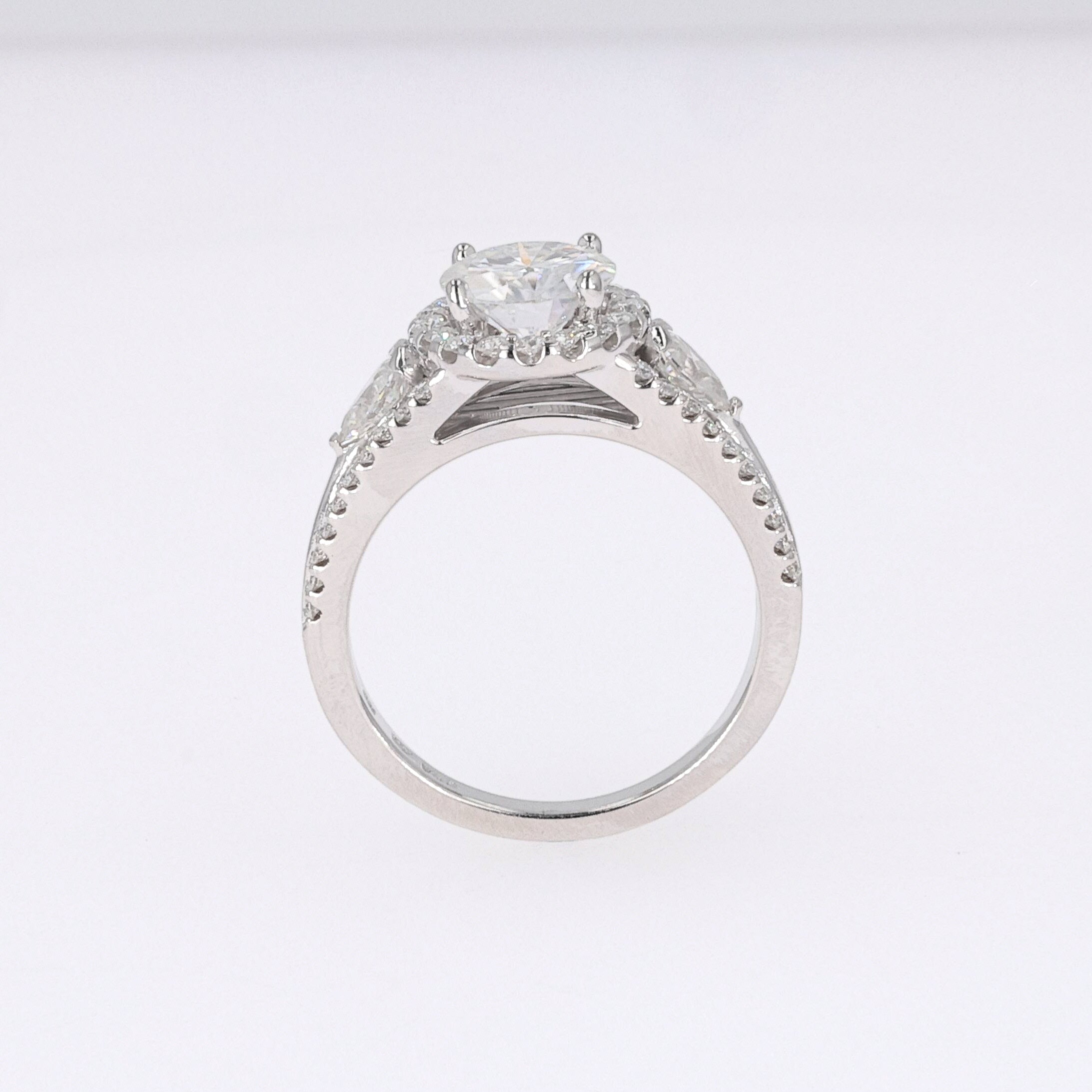 2.50 CTW DEW Round Near-Colorless Moissanite Three Stone Halo Ring in 14K White Gold
